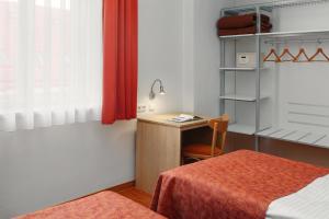 Postel nebo postele na pokoji v ubytování Hotel Ambiance