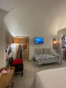 TV a/nebo společenská místnost v ubytování Tati's Home Bikers
