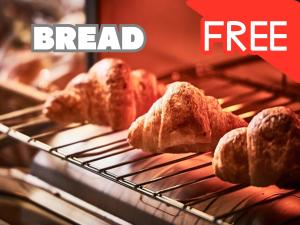 a group of bread on a rack in an oven at BaliAn Resort Forest Ikebukuro in Tokyo