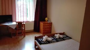Łóżko lub łóżka w pokoju w obiekcie Restauracja - Hotel Nova