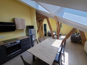 Kuchyň nebo kuchyňský kout v ubytování Le Florineige Vercors