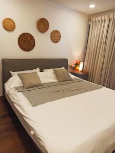 Postel nebo postele na pokoji v ubytování Cassia Riverside Villa