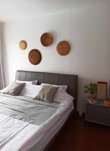 Postel nebo postele na pokoji v ubytování Cassia Riverside Villa