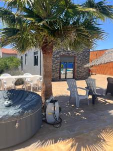 A seating area at Villa Berkania piscine privée - 8 pers