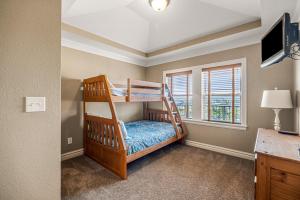 a bedroom with two bunk beds in a room at CSC4D - Ocean Daze in Kill Devil Hills +57 photos