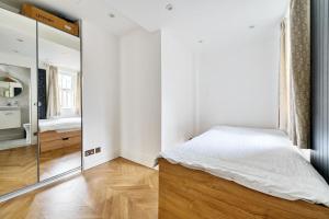 Ένα ή περισσότερα κρεβάτια σε δωμάτιο στο Luxury Modern 2 Bedroom Flat - 2 mins from Ascot Racecourse