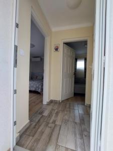 Postel nebo postele na pokoji v ubytování Laurus Vendéghàz