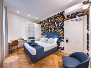 A bed or beds in a room at Albergo Abruzzi