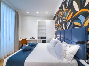 Postel nebo postele na pokoji v ubytování Albergo Abruzzi