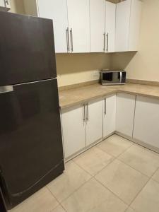 Kuchyň nebo kuchyňský kout v ubytování Hotel apartments Ninety Avenue Best Service