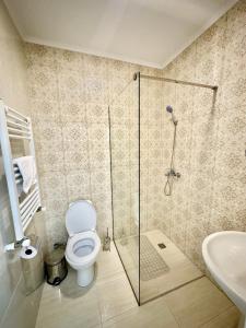 Koupelna v ubytování Hotel Paris