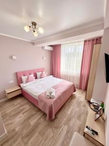 Postel nebo postele na pokoji v ubytování Hotel Paris