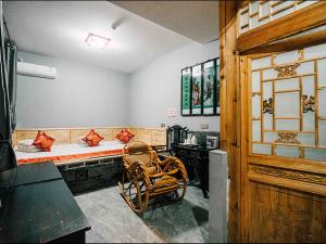 Pingyao Ancient City Manqiankun Inn County Yamen Branch的休息区