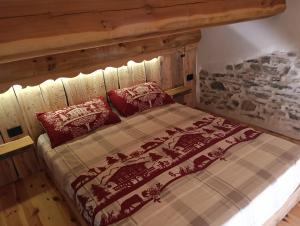 Postel nebo postele na pokoji v ubytování I Rododendri