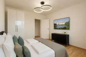Postel nebo postele na pokoji v ubytování Homely! Bright 3-Room Design Apartment Wiesbaden!