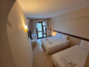 Foto dalla galleria di Atlas Apart Hotel a Çeşme Altre 20 foto