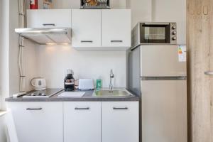 Kuchyň nebo kuchyňský kout v ubytování Studio home with sofa bed close to Valletta with Wifi by 360 Estates
