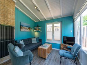 Μια τηλεόραση ή/και κέντρο ψυχαγωγίας στο Beachside holiday home