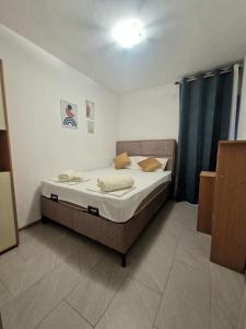 Ένα ή περισσότερα κρεβάτια σε δωμάτιο στο Apartment MMP2, Kotor +9 φωτογραφίες