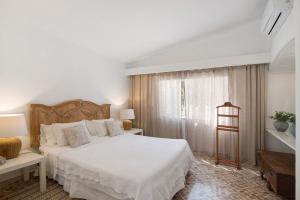 Postel nebo postele na pokoji v ubytování Casa Isabella + 24 fotografií