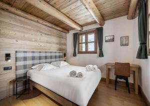 Postel nebo postele na pokoji v ubytování Chalet Charline