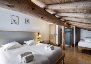 Postel nebo postele na pokoji v ubytování Chalet Charline
