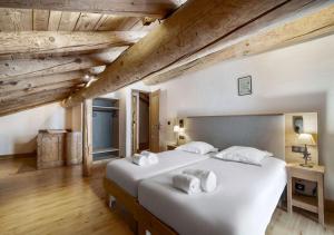 Postel nebo postele na pokoji v ubytování Chalet Charline