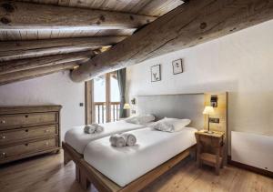 Postel nebo postele na pokoji v ubytování Chalet Charline