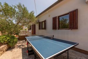 Stolný tenis v ubytovaní Villa Pine ZadarVillas alebo v jeho okolí