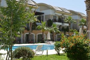 a view of the hotel from the pool at Sultan Homes Apartments 1 in Kemer