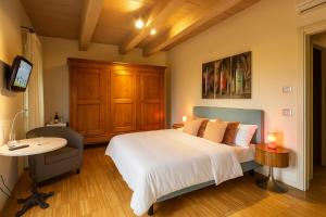 Postel nebo postele na pokoji v ubytování Agriturismo Trerè