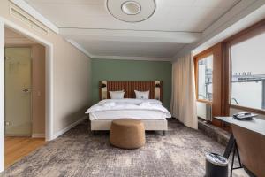 Postel nebo postele na pokoji v ubytování Imperial Hotel + 37 fotografií