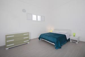 Postel nebo postele na pokoji v ubytování Casa FranCa