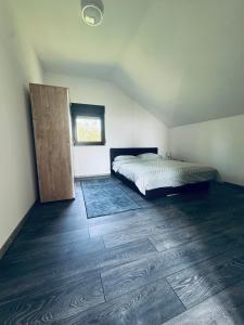 Postel nebo postele na pokoji v ubytování Lux apartmani