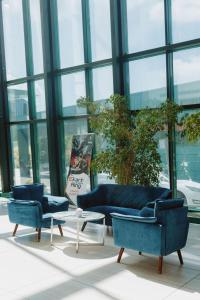 A seating area at Portobello Wellness & Yacht Hotel Esztergom