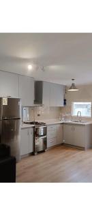 Η κουζίνα ή μικρή κουζίνα στο Casa Residencial Puerto Varas