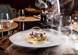 a dessert on a plate on a table at InterContinental Sofia by IHG in Sofia