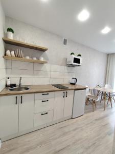 Dapur atau dapur kecil di Квартиры в центре города