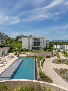 Bazén v ubytování Holiday Rentals at Camiral Golf & Wellness nebo v jeho okolí