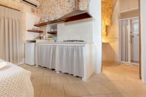 Kuchyň nebo kuchyňský kout v ubytování Borgo del Sole Salento