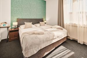Krevet ili kreveti u jedinici u okviru objekta 7Days B&B