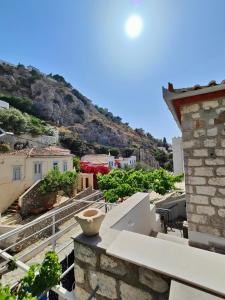 a view from the balcony of a house at Flora's House in Hydra