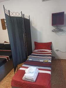 Postel nebo postele na pokoji v ubytování ViiLa s'un sfert