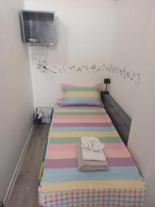 Postel nebo postele na pokoji v ubytování ViiLa s'un sfert