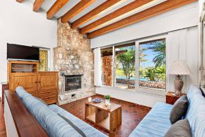 A seating area at Villa Diamante by Villa Plus