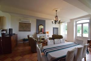 Posezení v ubytování Maison à la campagne pour 8 personnes - Clévacances 3 clés