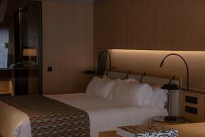 Una cama o camas en una habitación de The Blackpine Hotel - Small Luxury Hotels