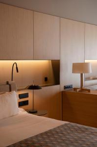 Una cama o camas en una habitación de The Blackpine Hotel - Small Luxury Hotels
