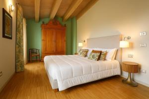 Postel nebo postele na pokoji v ubytování Agriturismo Trerè