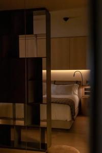 Una cama o camas en una habitación de The Blackpine Hotel - Small Luxury Hotels